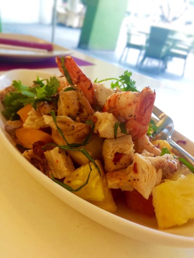 Grilled chicken and shrimp mixed with fresh fruit and tossed with Thai vinaigrette, roasted nuts, fried shallots, and cilantro.